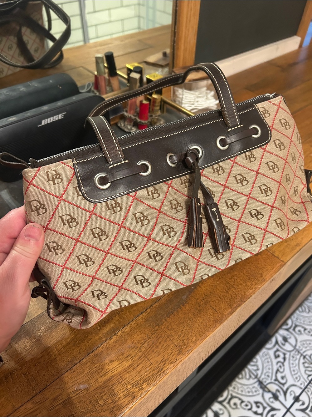 Dooney & Bourke Beige Canvas Shoulder Bag with Brown Trim and Red Accents